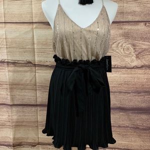 Black mini pleated skirt